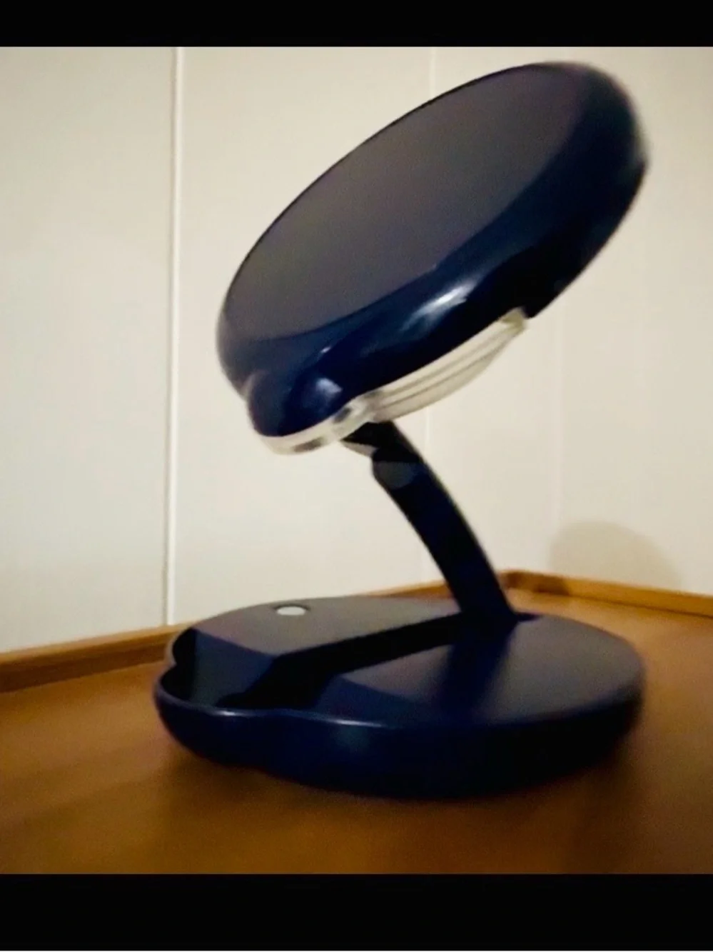 Blue Countertop Makeup Mirror, adjustable arm, lights on mirror.